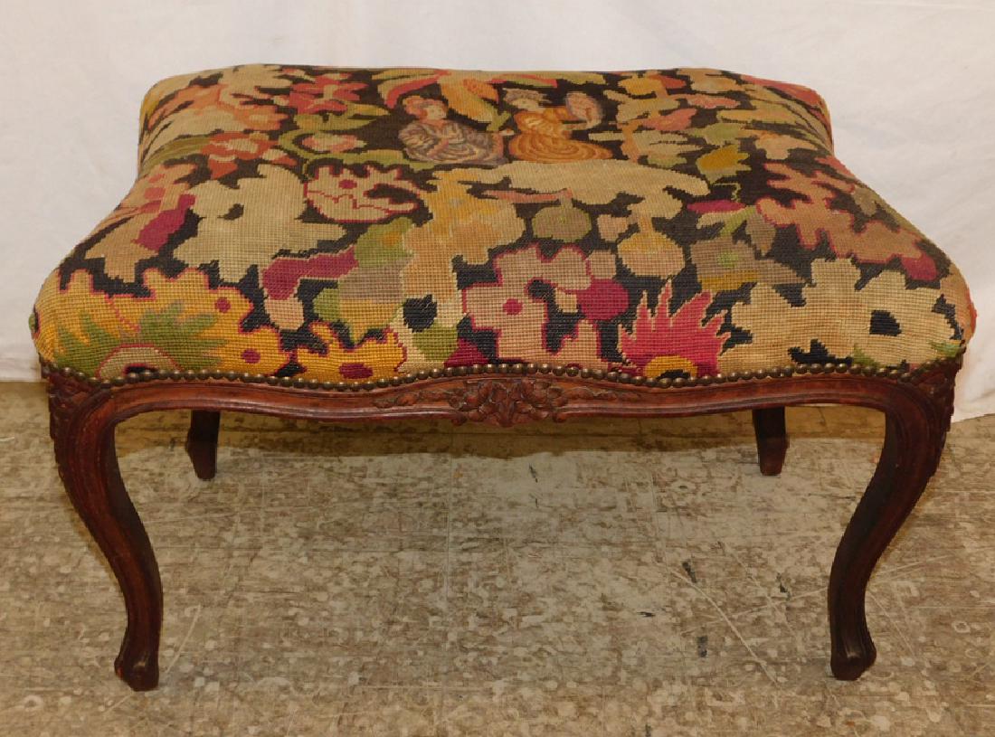 Needlepoint carved French ottoman. (1 of 2)