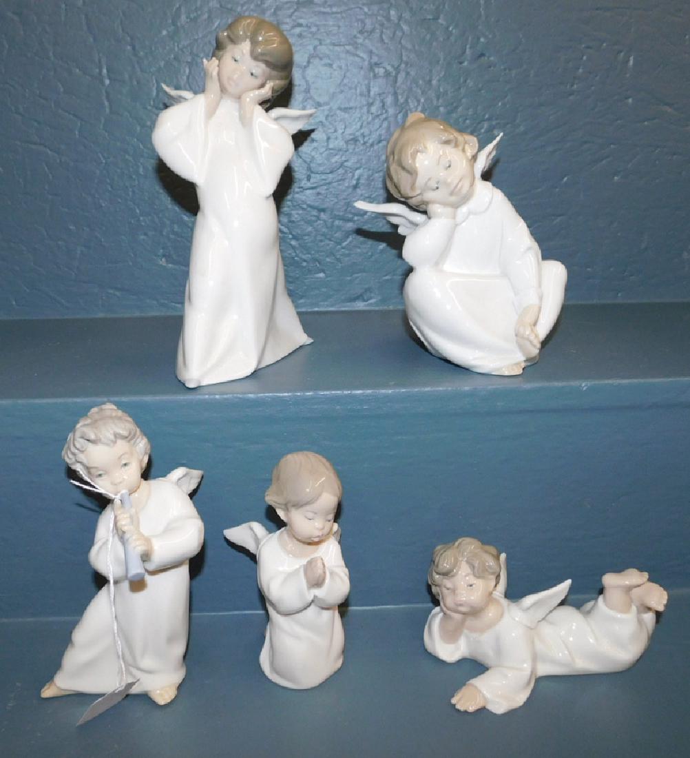 4 Lladro porcelain angels. (1 of 2)