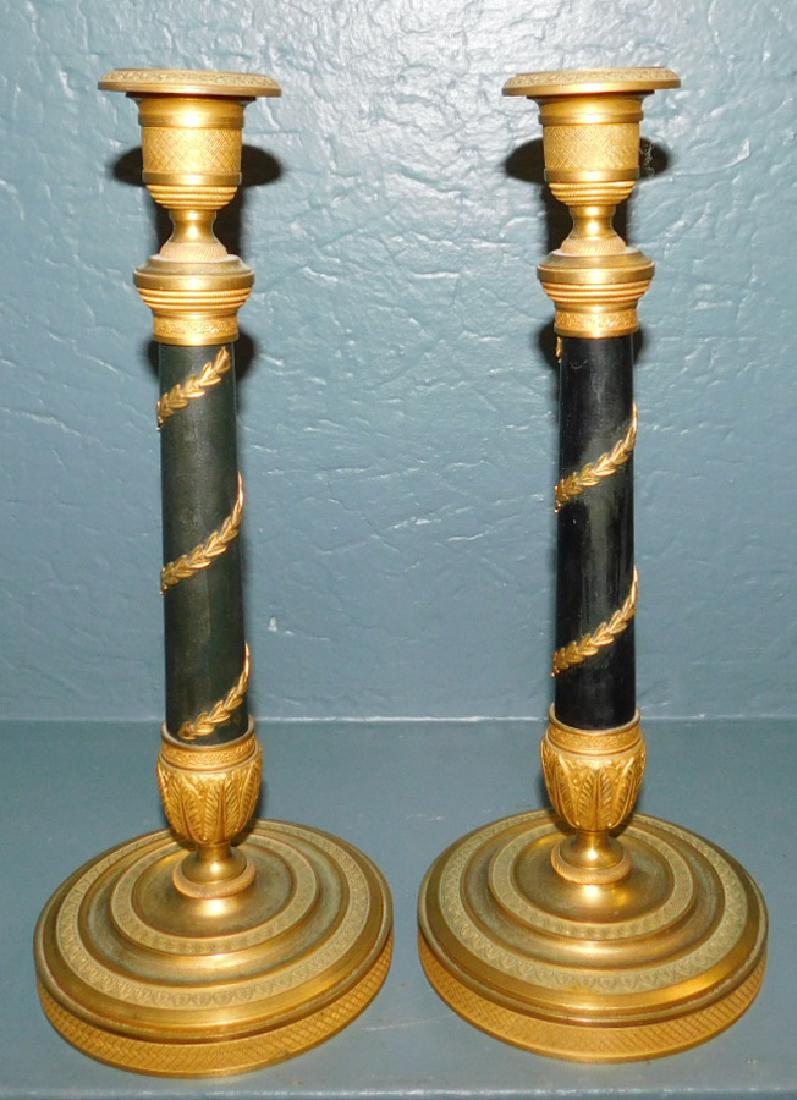 Pair of French bronze Empire candlesticks. (1 of 2)