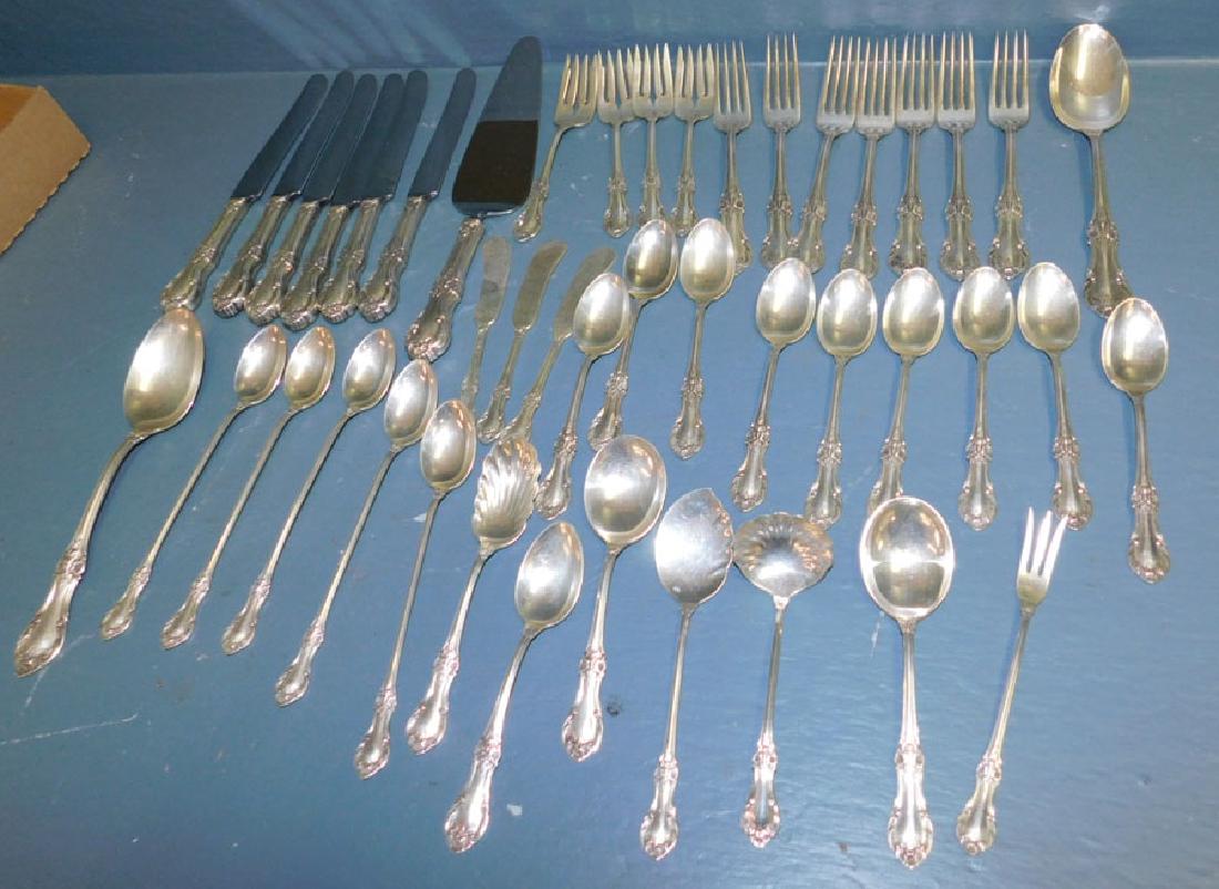 44 pc. International "Wild Rose" sterling flatware. (1 of 2)