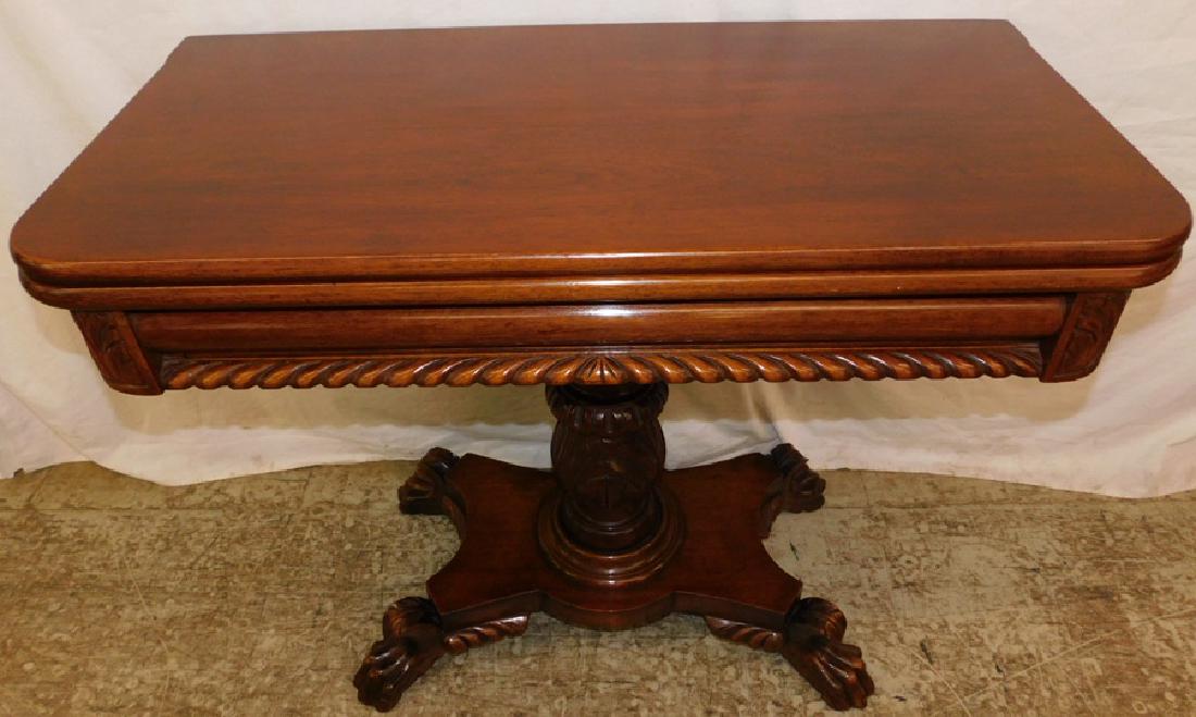 Mahogany fold over antique game table. (1 of 3)