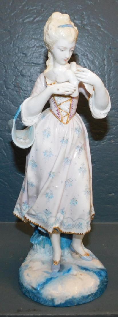 Beautiful porcelain figure of lady with dove. 12" tall. (1 of 2)