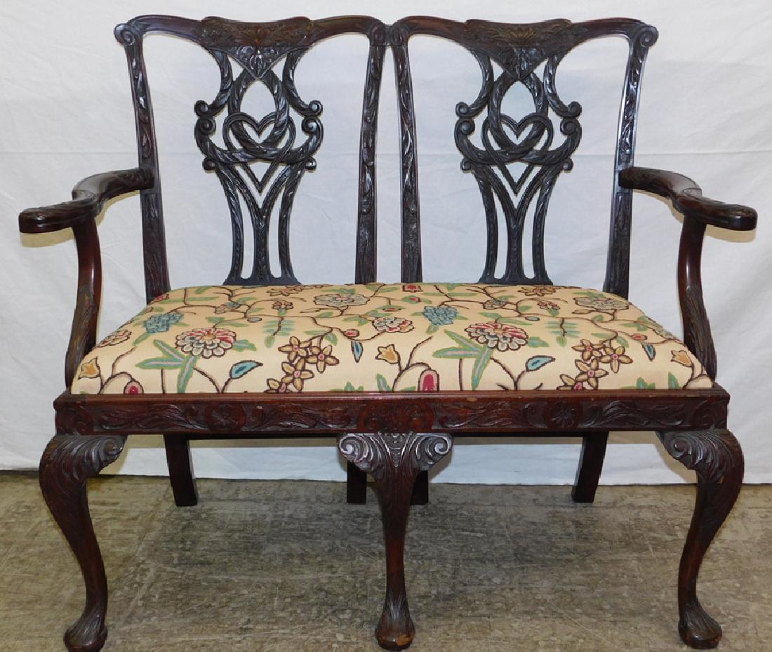 19th C mah 2-seat settee w/ carved arm & legs.: 19th C mahogany two seat settee with carved arm and legs. 40" long.