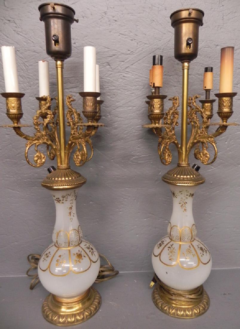 Pair of white opaline candelabra lamps. 25" tall.: Pair of white opaline candelabra lamps. 25" tall.