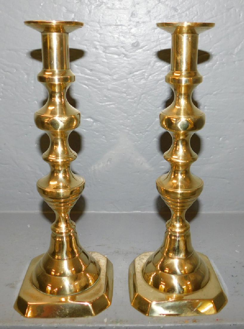 Pair of early brass push up beehive candlesticks. (1 of 2)
