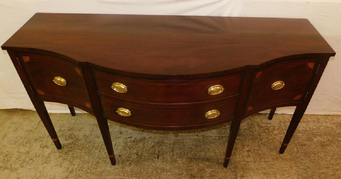 Kittinger Serpentine front inlaid mahog sideboard.: Kittinger Serpentine front inlaid mahogany sideboard. 70" wide x 25 1/2" deep x 37" tall.