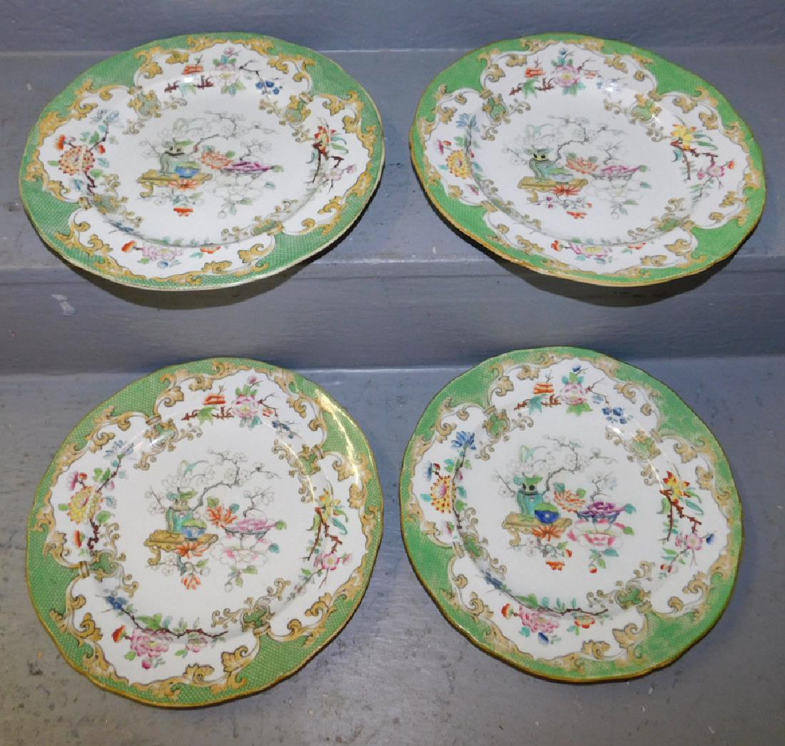 4 Ironstone hand painted plates. 10" dia. (1 of 3)