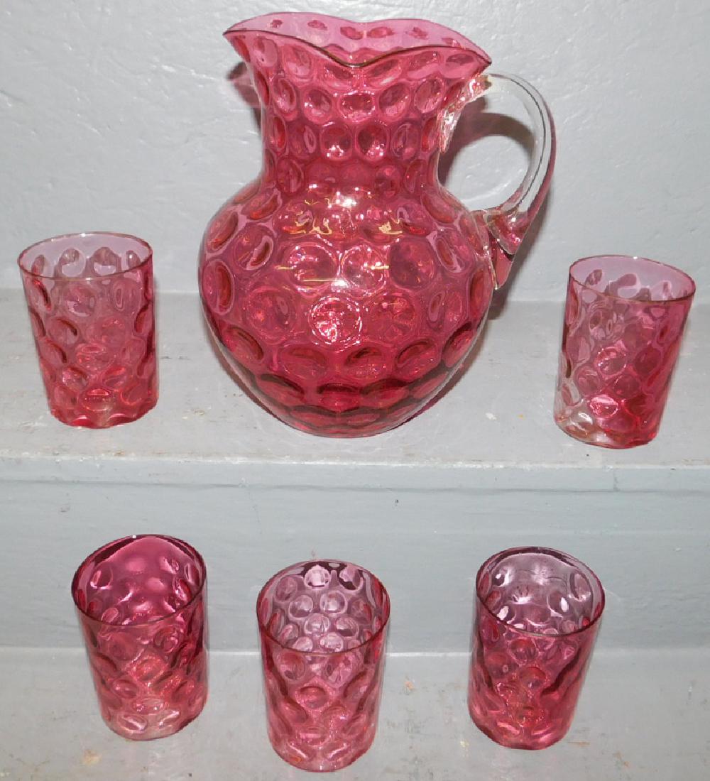 Six pc. Thumbprint cranberry glass water set. (1 of 1)