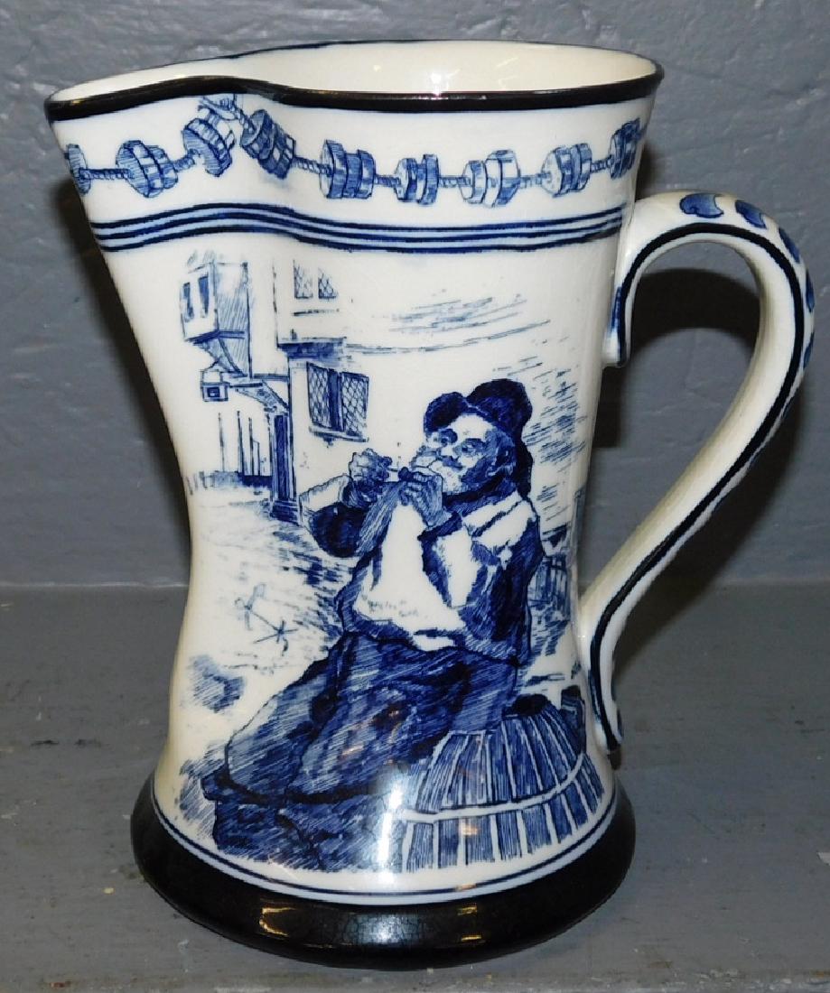 Royal Doulton blue decorated pitcher. 8" tall. (1 of 3)