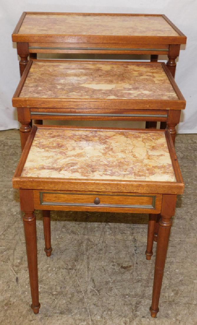 Set of three marble top nesting tables. (1 of 3)
