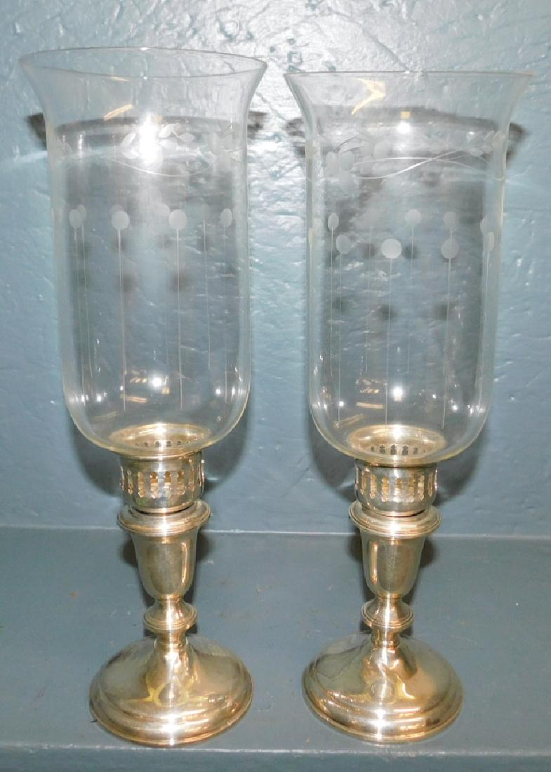 Pair of sterling weighted candlesticks with shades. (1 of 2)