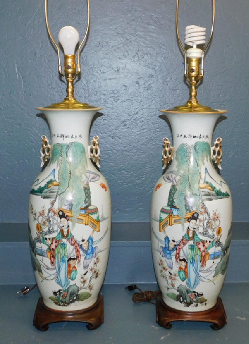 Pair of Oriental vase lamps. 47" tall with finial.