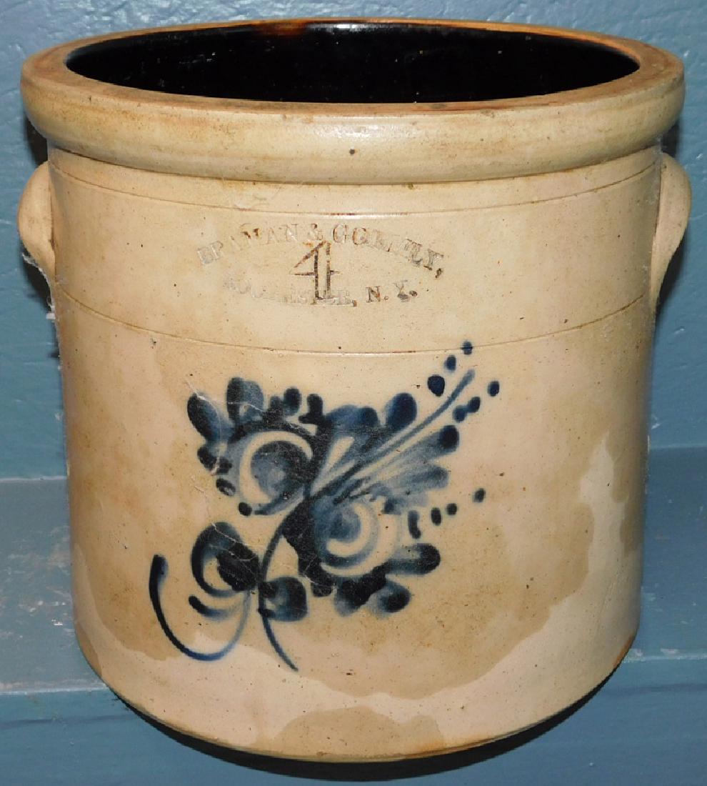 4 gallon blue decorated Rochester NY churn: 4 gallon blue decorated Rochester NY churn marked Bradman Gormley. 12" dia. X 11" tall.