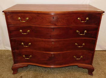 18th C Serpentine front mahogany American chest.