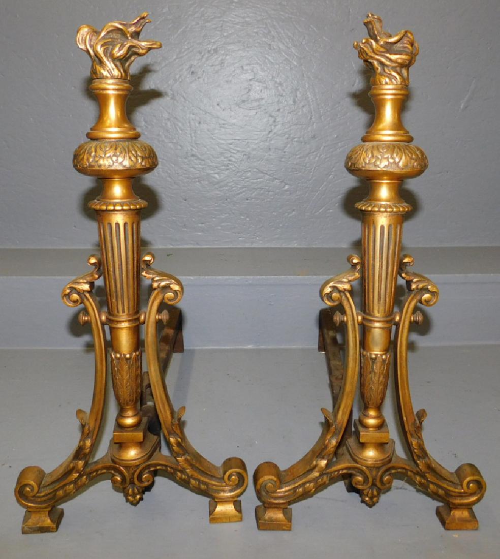 Pair of flame top brass andirons. 22" tall.: Pair of flame top brass andirons. 22" tall.