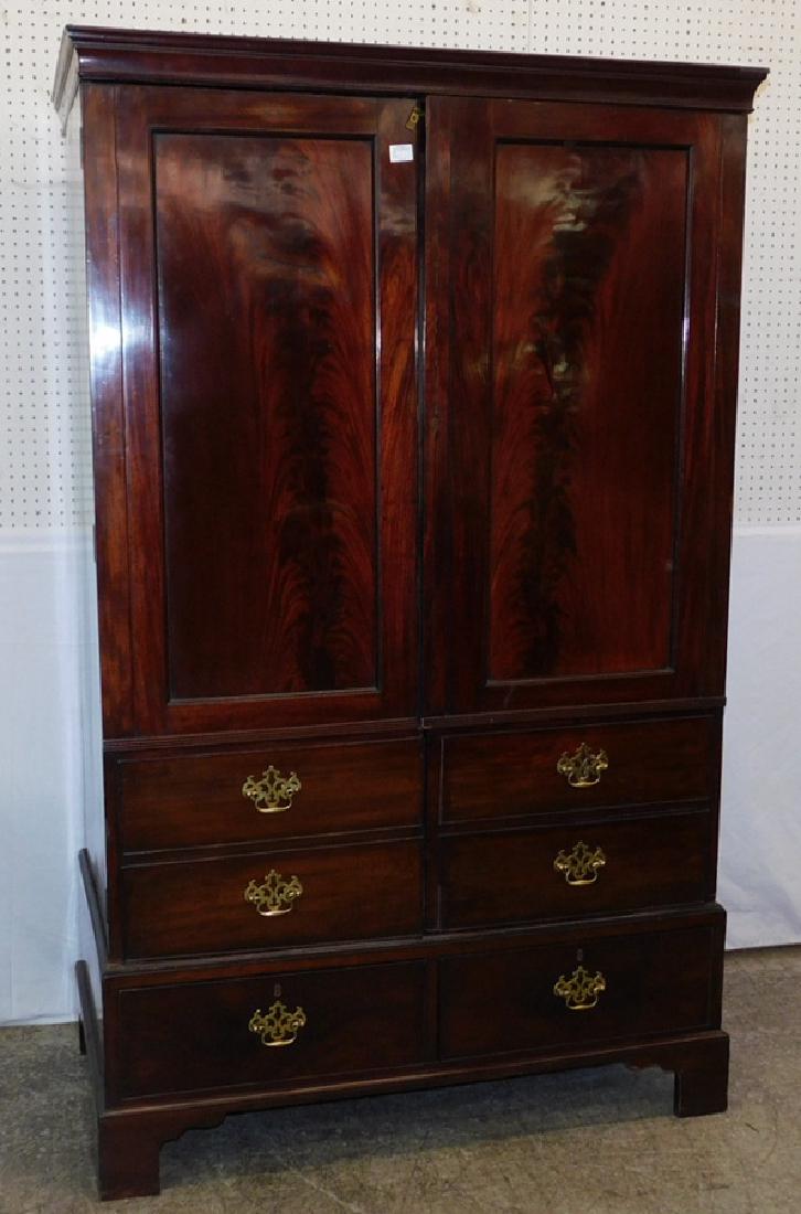 19th c Mahogany linen press entertainment center.: 19th century Mahogany linen press entertainment center. 47" wide x 25 1/2" deep x 78" tall.