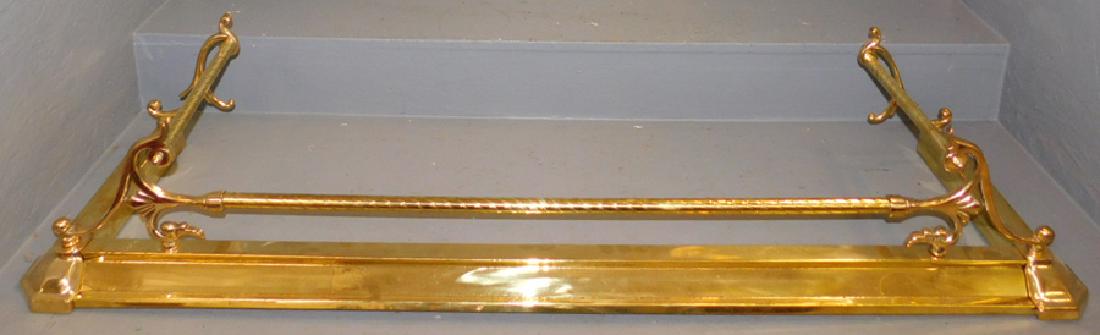 Brass fire fender. 52" long.: Brass fire fender. 52" long.