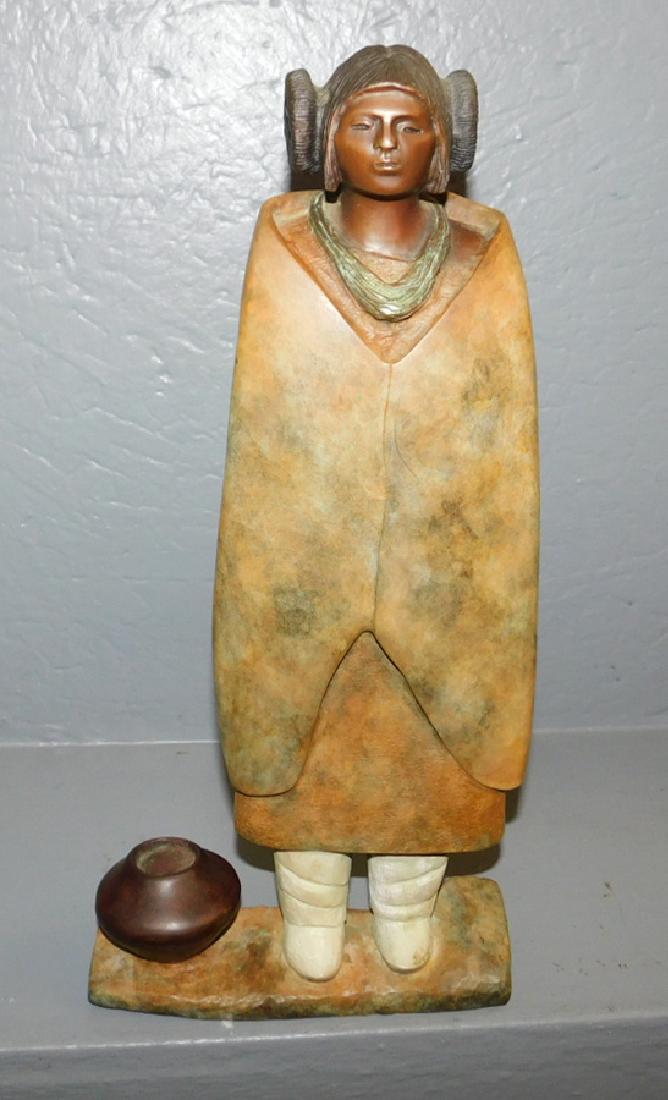 Bronze Inuit figure. 15" tall.: Bronze Inuit figure, signed: D. Hyde. 15" tall.