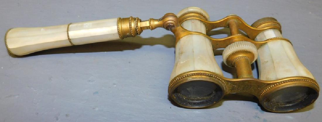 Mother of pearl opera glasses.: Mother of pearl opera glasses. One ocular lens is missing. one ocular lens is missing