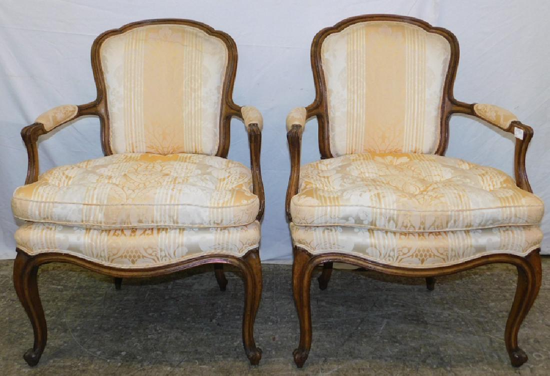Pair of French antique arm chairs.: Pair of French antique arm chairs. 36" tall.