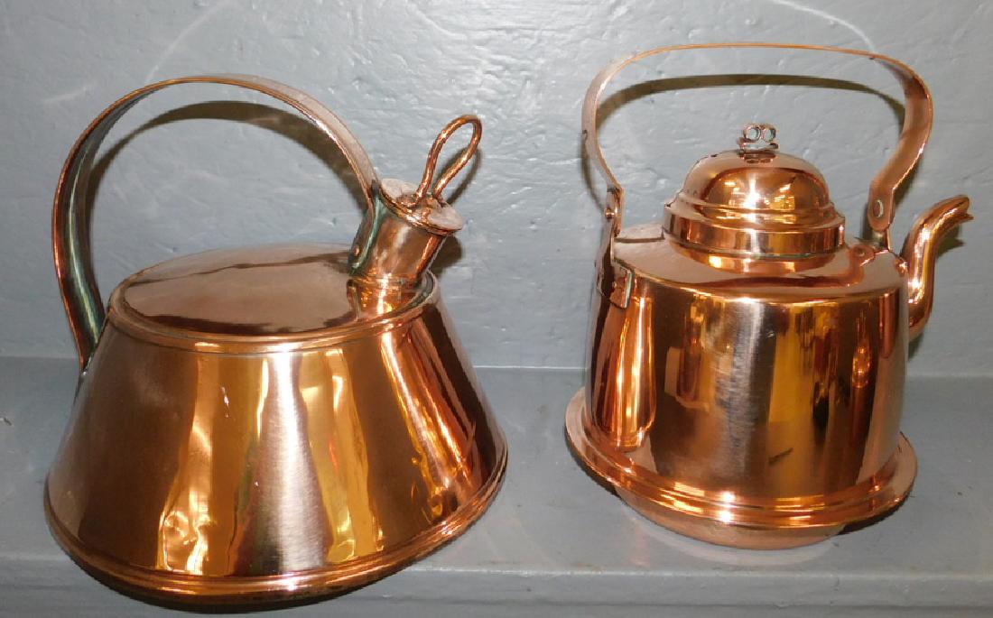 Two 19th C polished copper tea kettles.: Two 19th century polished copper tea kettles. To 10" tall.