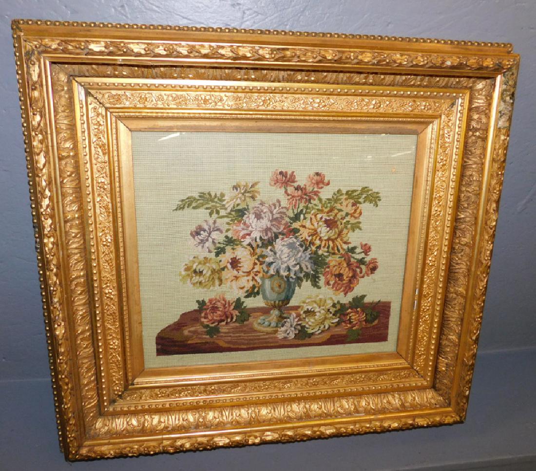 Needlepoint still life in gold frame: Needlepoint still life in gold frame from Wilmington estate. 25" x 24".