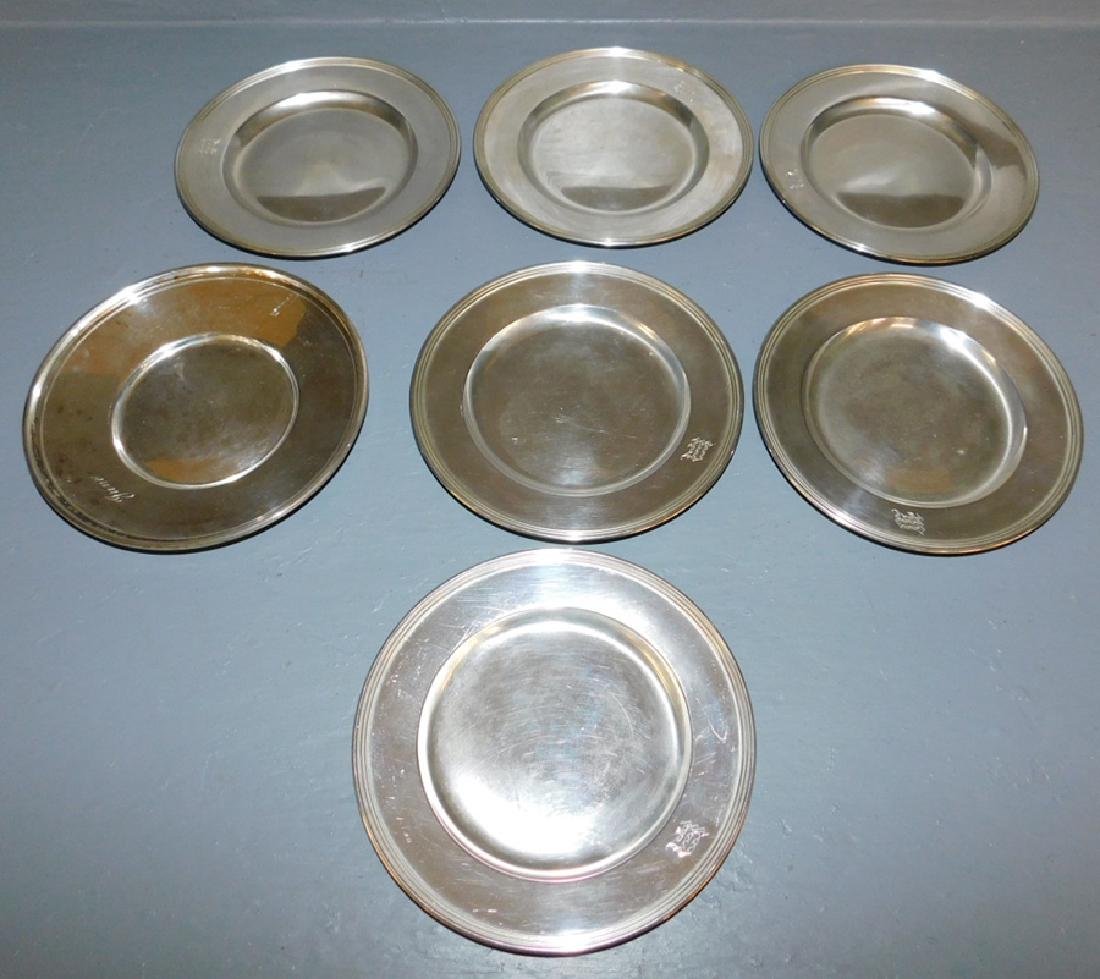 Seven sterling bread and butter plates. 18 t.o.: Seven sterling bread and butter plates. 18 t.o. 6" dia.