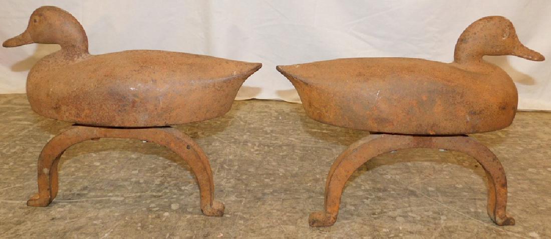 Cast iron duck andirons.: Cast iron duck andirons. 12" tall.