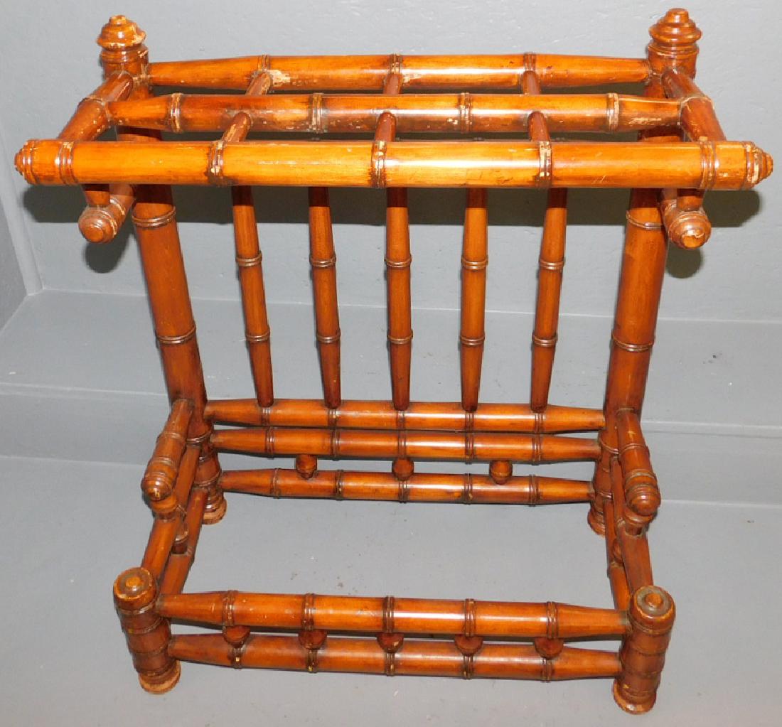 Faux bamboo antique umbrella stand.: Faux bamboo antique umbrella stand. 25" wide x 9 1/2" deep x 29" tall.