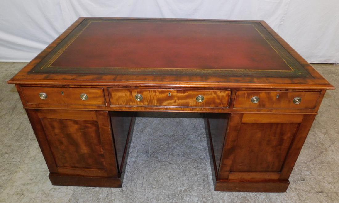 Tooled leather top mahogany partners desk.: Tooled leather top mahogany partners desk. 60" wide x 41" deep x 32" tall.