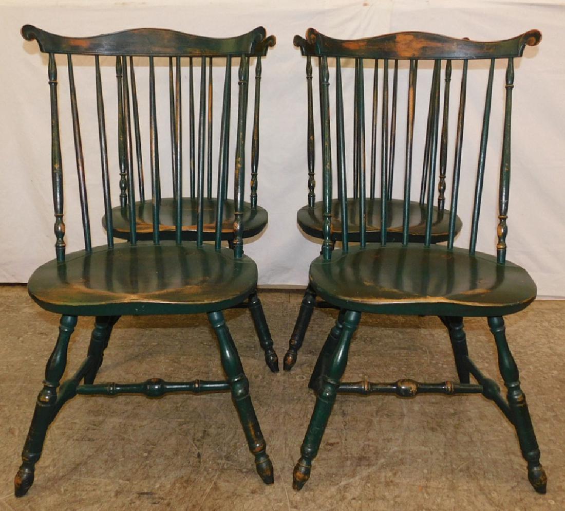 Set of 4 painted American Windsor chairs.