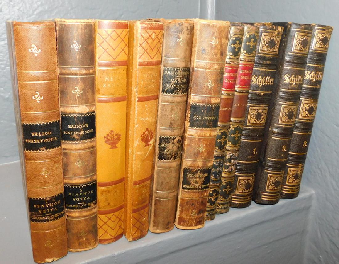 11 quarter Leather bound books. (1 of 2)