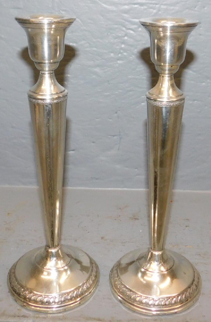 Pr. weighted sterl. gadroon border candlesticks (1 of 1)