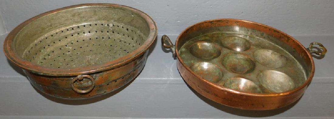 Polished copper strainer and egg poacher.: Polished copper strainer and egg poacher.
