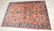 5' x 3.5" antique Sarouk rug.
