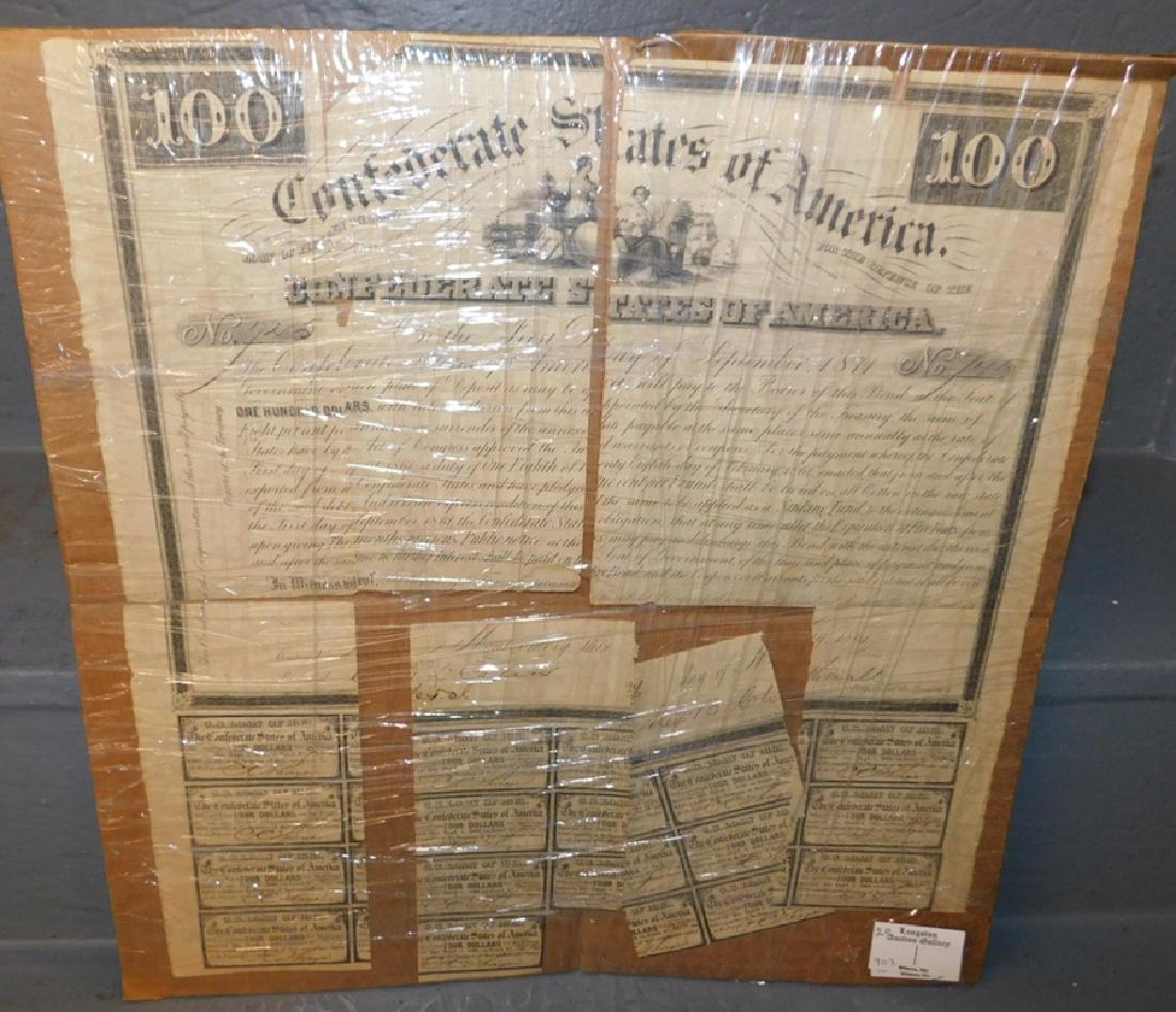 $100 Confederate promissory and interest notes.: $100 Confederate promissory note with interest notes attached. Poor condition.