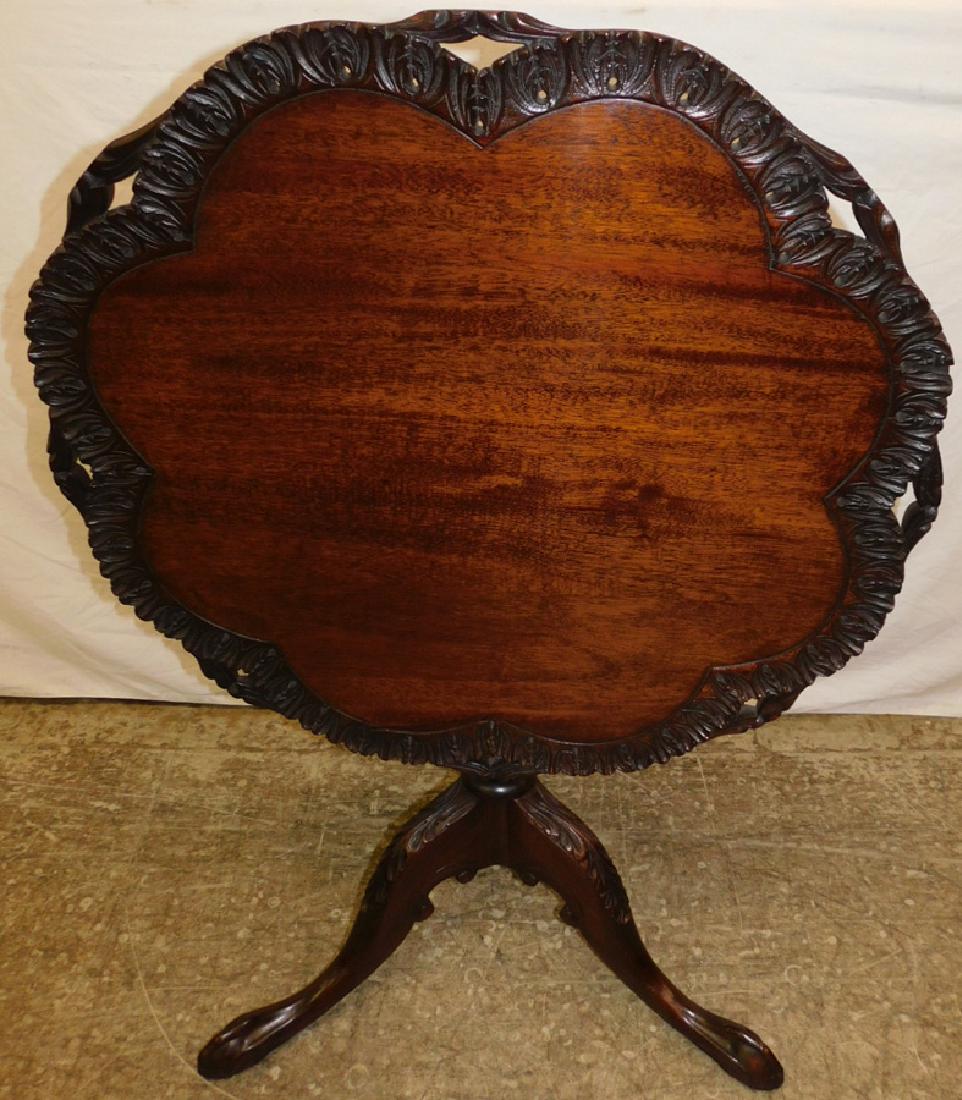 Piecrust ball and claw foot tilt top table.: Piecrust ball and claw foot tilt top table. 30" dia. x 28" tall.