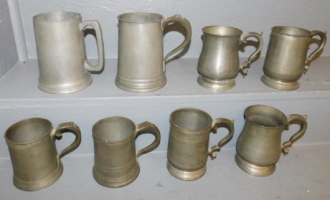 8 antique pewter mugs. (1 of 6)