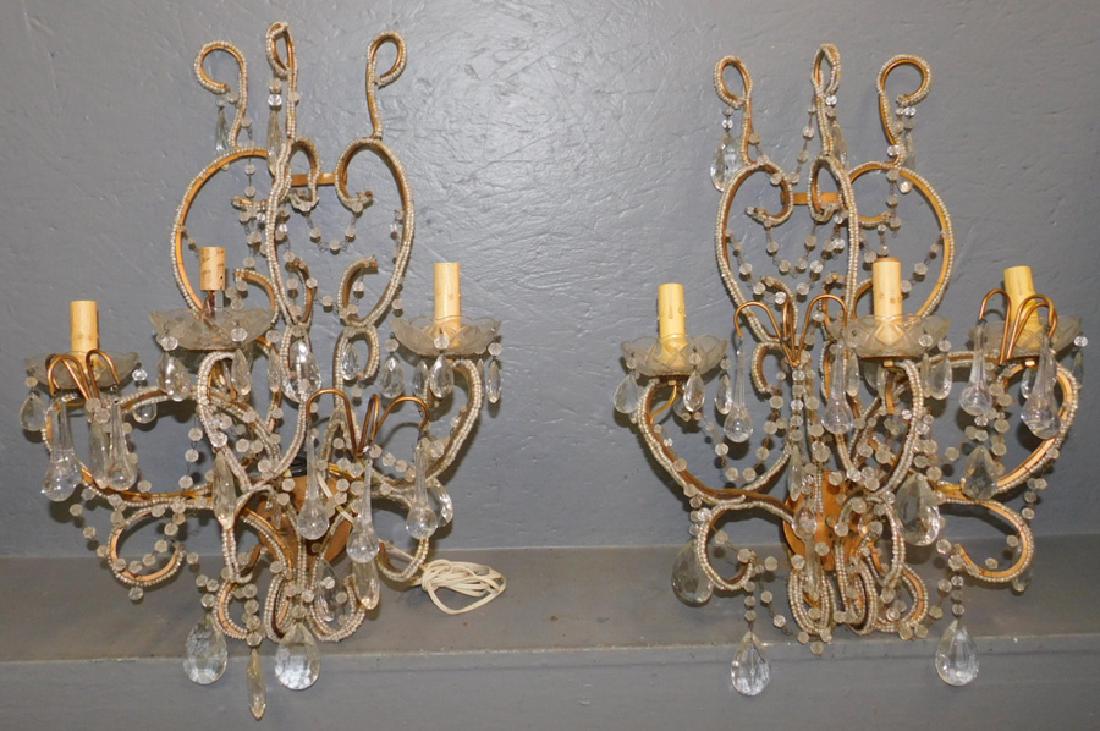 Pair Crystal and wrought metal wall sconces. (1 of 2)