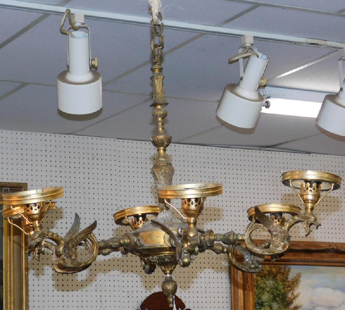 Gryphon arm 6 light brass chandelier. (1 of 3)