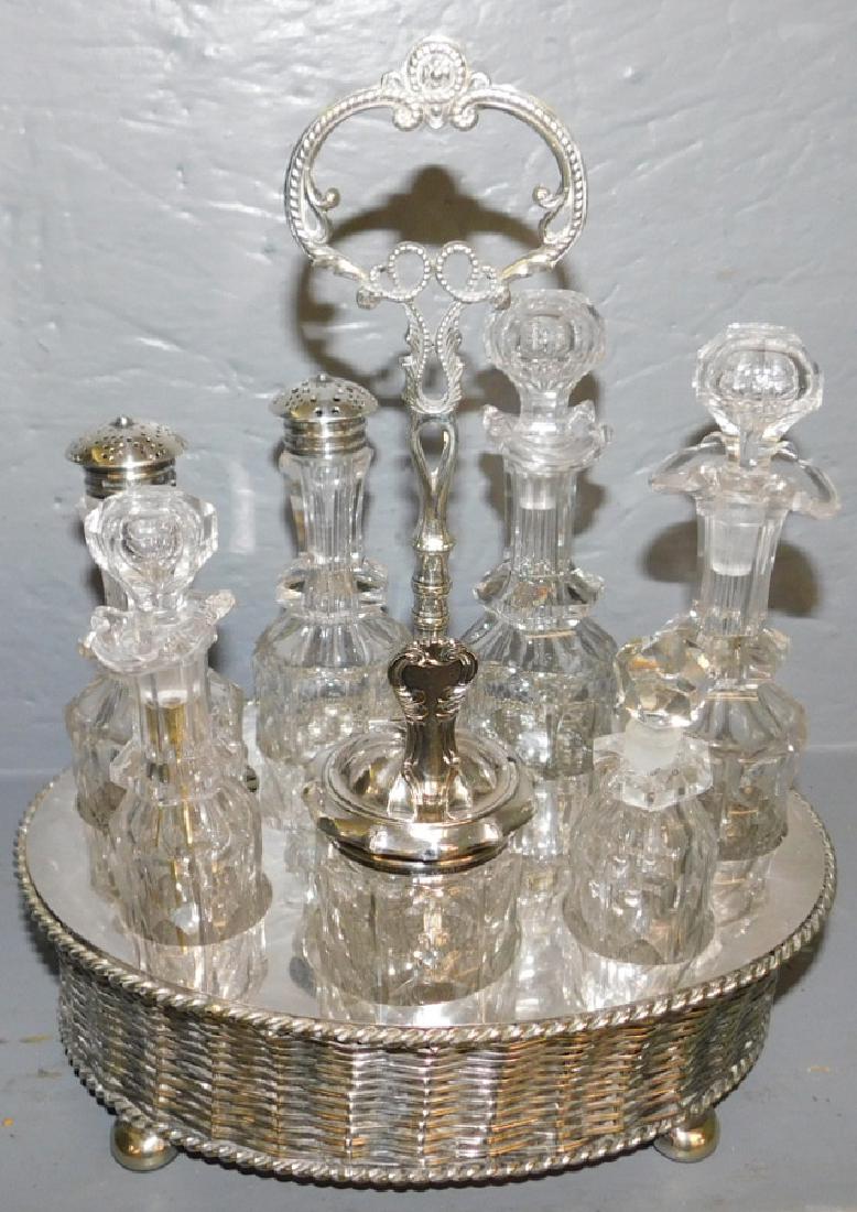 Elkington sterling lid cruet stand: Elkington sterling lid cruet stand. 8 wide x 6" deep x 11" tall.