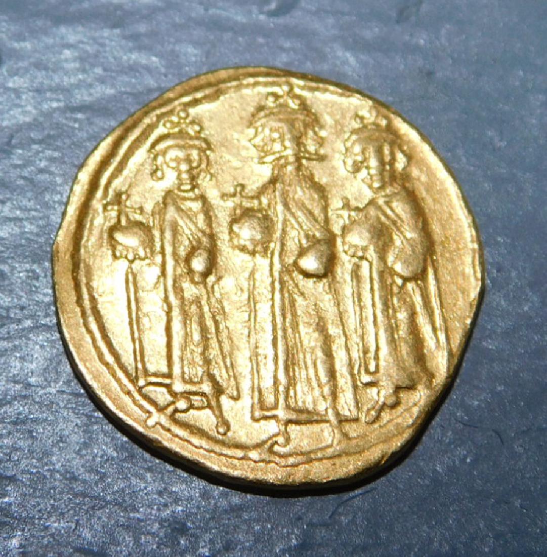 Ancient Byzantine Heraclius type gold coin. (1 of 2)