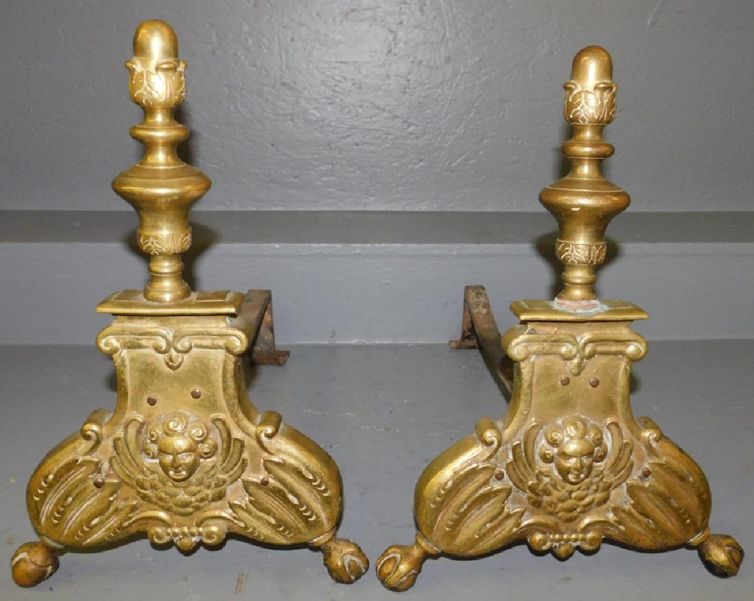Pair Of Brass Cupid Andirons: Pair Of Brass Cupid Andirons. 16" H