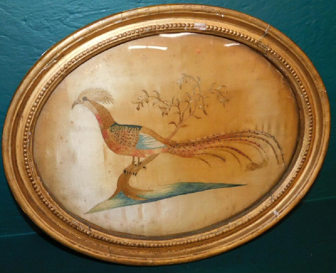 Oval Framed Crewel Work Of A bird: Oval Framed Crewel Work Of A bird. 17" X 13"