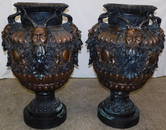 Pair of bronze ornate urns