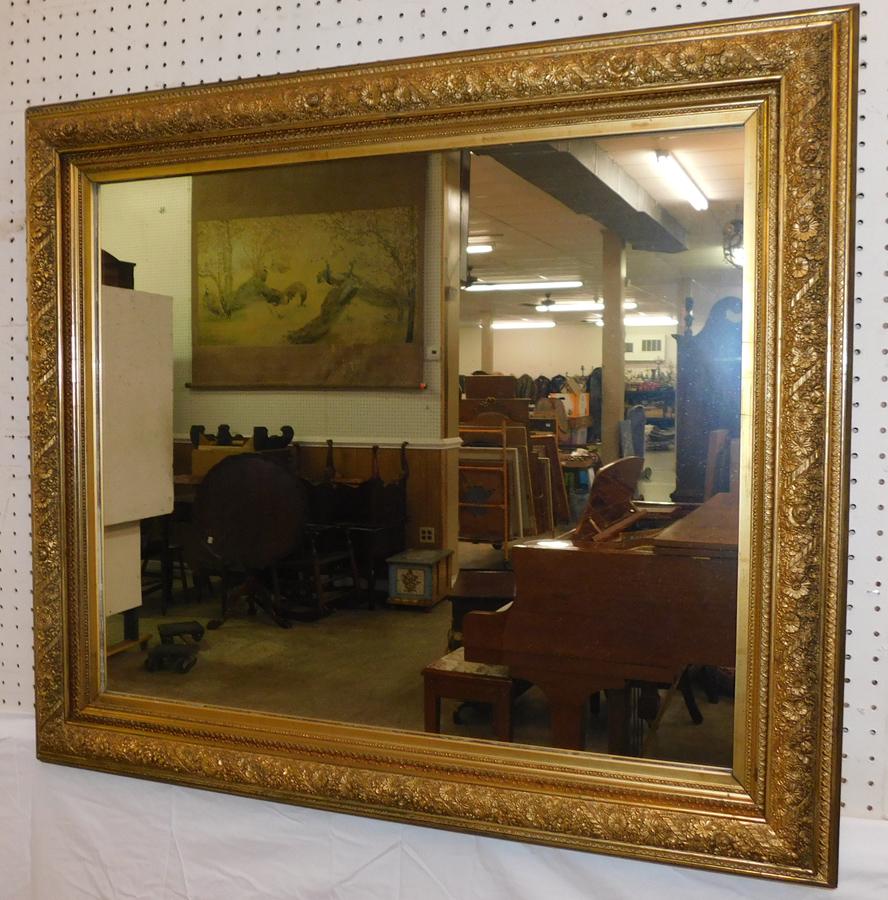 Antique Gold Leaf Framed Mirror: Antique Gold Leaf Framed Mirror. 37 1/2" X 32 1/2"