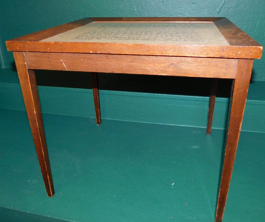 Framed sampler tea table dated 1816: Framed sampler tea table dated 1816. 21" W x 19" D 18 3/4" H