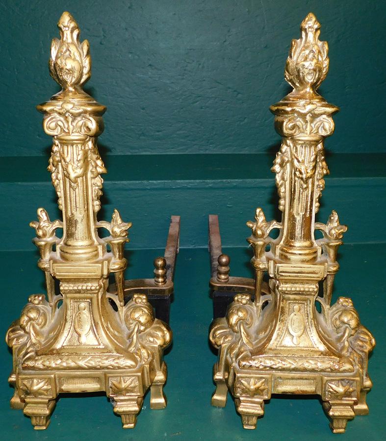 Pair of torched brass andirons: Pair of torched brass andirons. 17 1/4" H
