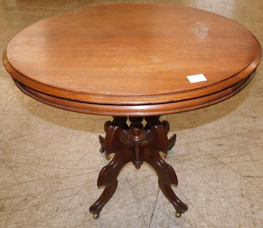 Victorian Walnut Oval Table: Victorian Walnut Oval Table. 28 1/2" W 23" D 29 1/4" H