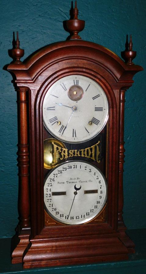 Walnut Seth Thomas Fashion Clock: Walnut Seth Thomas Fashion Clock. 16 1/2" W 5 3/4" D 31 3/4" H